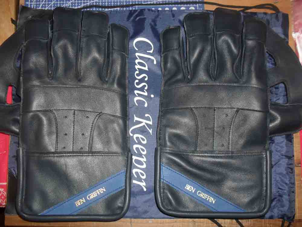 Ben Griffin black gloves with blue name tag