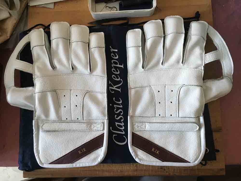 White wicket keeping gloves