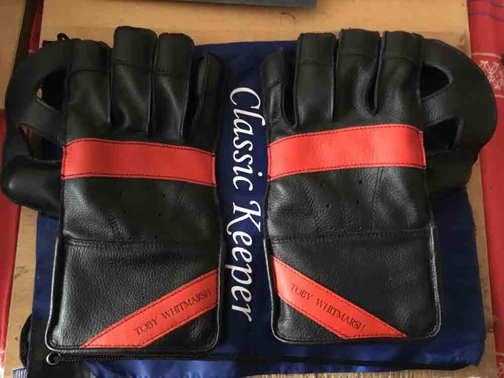 Black gloves with orange features